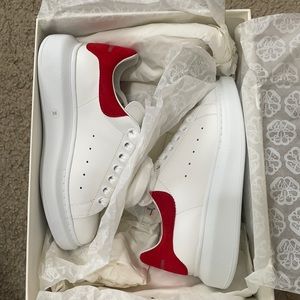 Alexander McQueen. Never worn. Brand new in box. Size 3 but fits like 6 in woman